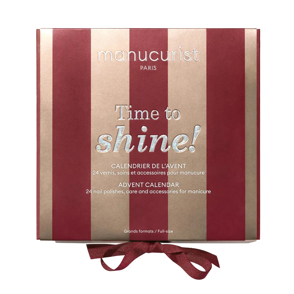 Manucurist Time to Shine Adventskalender 2026 in rot-goldener Geschenkbox mit Schleife