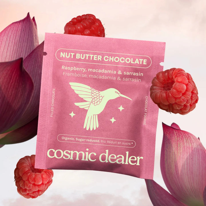 Cosmic Dealer Raspberry & Macadamia Chakra Chocolates mit Himbeerfüllung als Kunstfoto